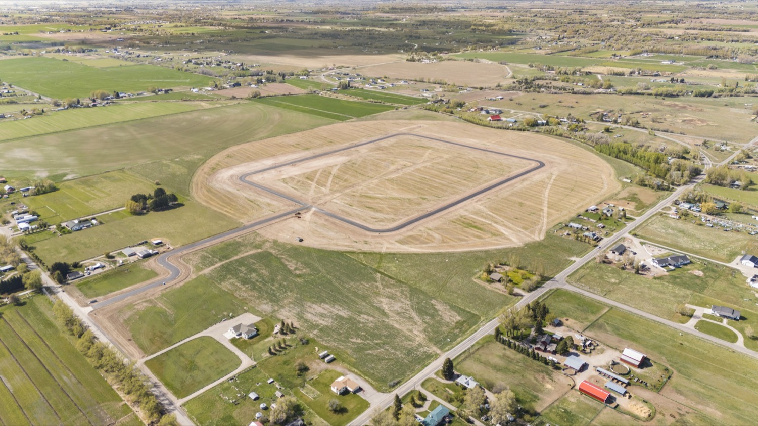 Aerial of the development and surrounding farmland